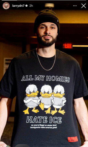 Instagram picture by @larrydn7 of Nance in a hat, chain, and with a black t-shirt saying "all my homies hate ICE" with three angry cartoon ducks in between these large words. below that on the shirt in smaller type: "no one is illegal on stolen land immigrants make america great"